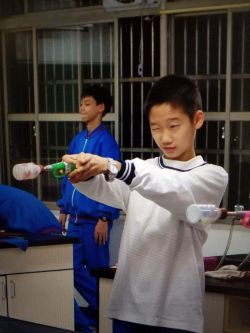 13-year-old me playing with some very fun science experiment